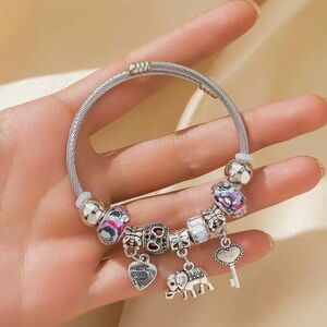 Silver Charm Bracelet with Pink Accents